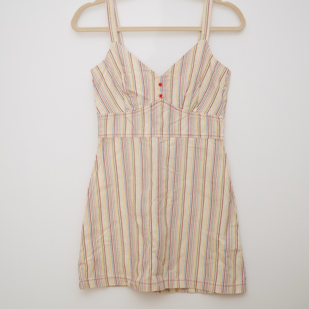Rainbow pin striped mini dress with red buttons.